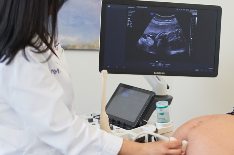 A technician performing an ultrasound